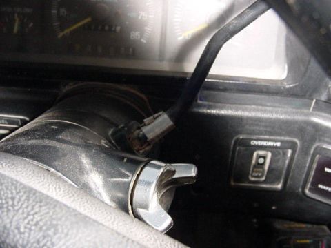 1992 Ford Bronco - Interior view of a 1992 Ford Bronco, dashboard gauges and an overdrive control.