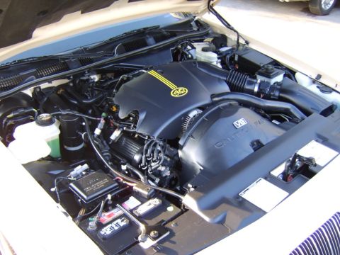 1996 Mercury Grand Marquis - Close-up view of a V8 engine bay, showing various components and wiring.
