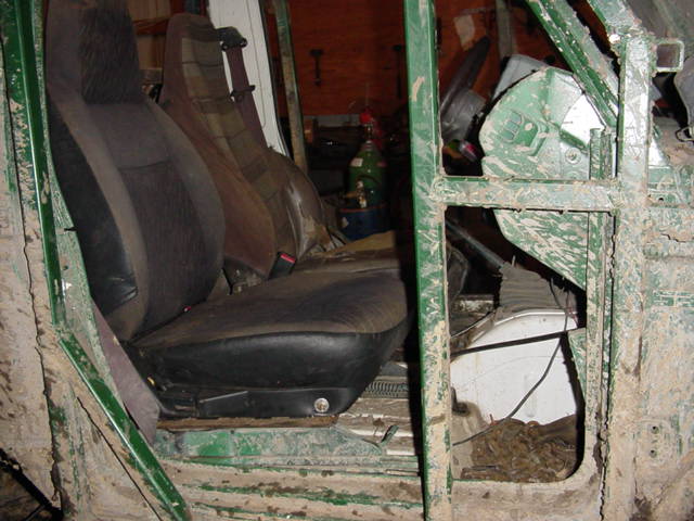 seats out of 93 tracker.  some fabbing to get in.  tracker closest to camera, beat up samarai farthest from camera