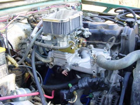 1992 Ford Bronco - new weber carb with offroad mods made to it by sarge.