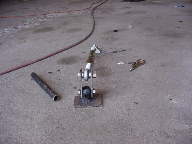 uses 3 point hitches as the arm and a didge track bar bushing and end is welded to that plate.