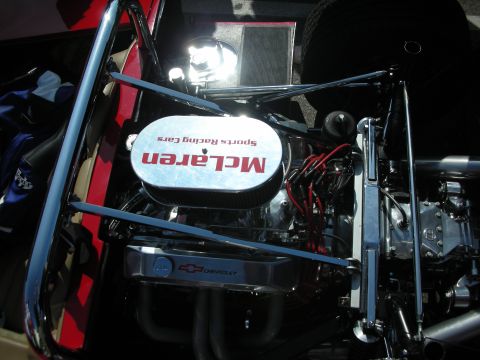 1998 Ford Crown Victoria - Chevrolet V8 wearing a McLaren Sports Racing Cars air cleaner and chrome bowtie valve cover sits in a chrome tube-frame chassis.