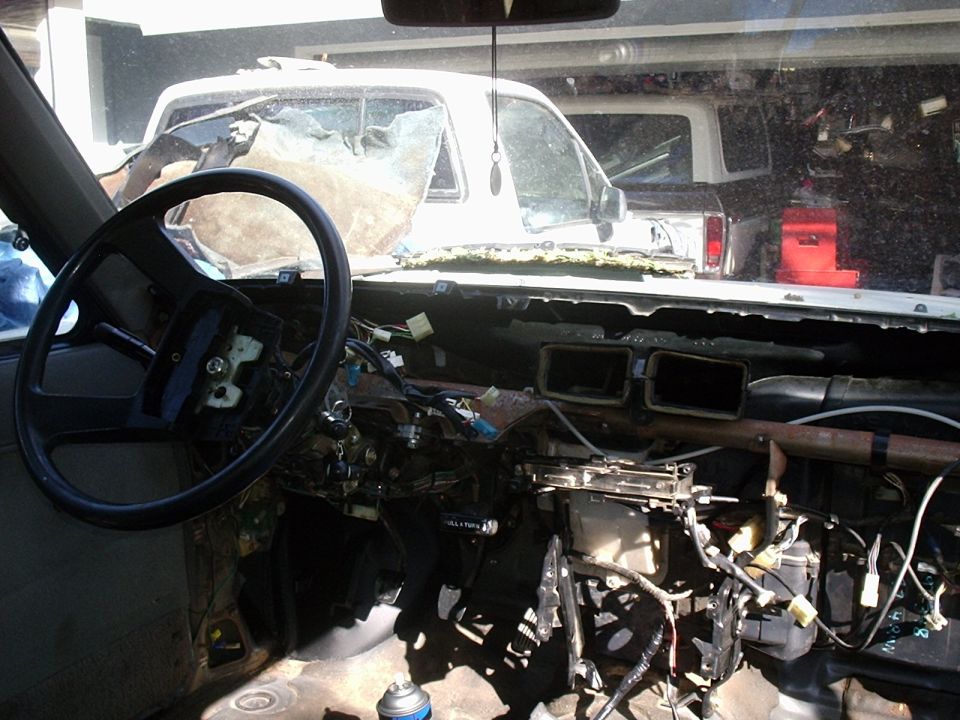 A picture of the dash torn out from the heater core change out, while I was there I cleaned all the dash parts and armor alled them, repaired all the bad wireing and removed all the tweaker wiring bullshit.