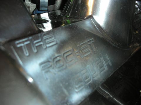 1992 Ford Crown Victoria - Close-up of an engine component with "THE ROCKET COUGH" clearly visible.