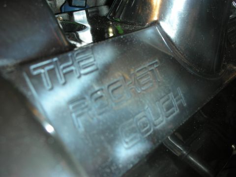 1992 Ford Crown Victoria - Embossed text 'THE ROCKET COUCH' on a black component.