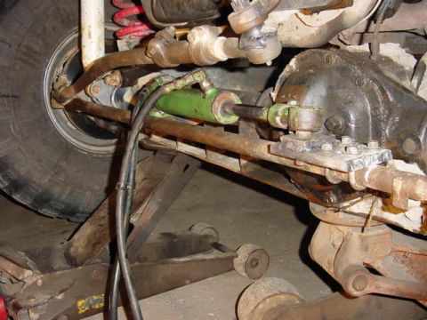 1992 Ford Bronco - tie rod bracket. Not finshed, but fit to it. plan on using U bolts and weld layed on each side to prevent them from moving. the 1" steel th…
