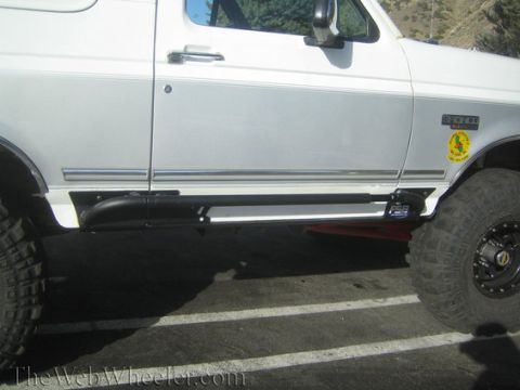 1996 Ford Bronco - This 1996 Ford Bronco features a two-tone paint scheme and off-road modifications.
