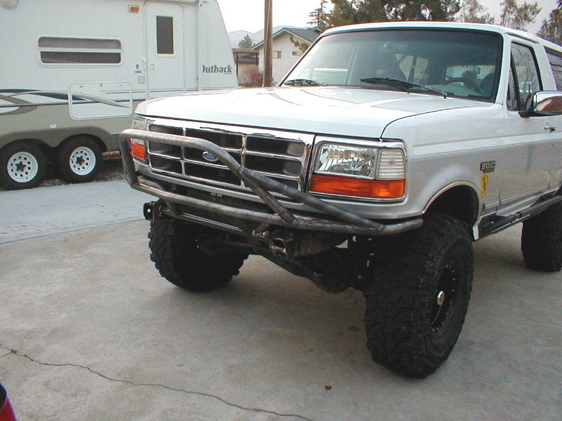 1996 Ford Bronco with custom front bumper and large tires