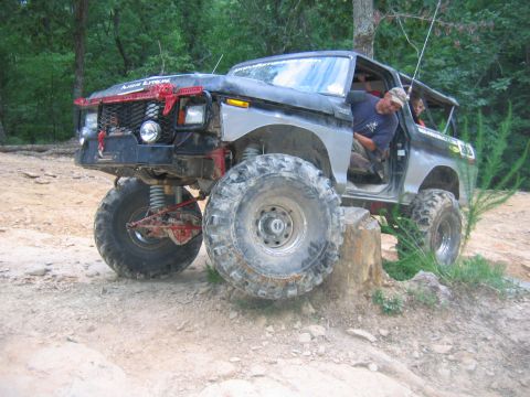 1992 Ford Mustang - This heavily modified truck is equipped for extreme off-roading with its lifted suspension and oversized tires.