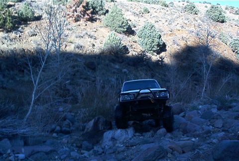 1986 Ford Bronco - This 1986 Ford Bronco navigates a rocky, off-road path.