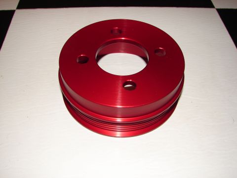 1992 Ford Taurus - Red aluminum pulley with a grooved outer edge and three mounting holes.