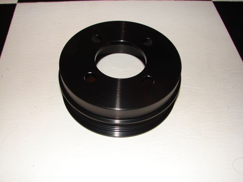1992 Ford Taurus - A black crankshaft pulley is shown against a checkered and white background.
