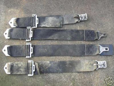 1978 Ford Bronco - Set of four used seat belts with metal buckles and mounting hardware.