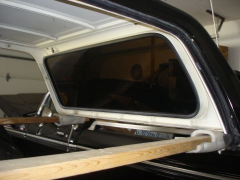 1979 Ford Bronco - Close-up view of the rear quarter window and roofline of a 1979 Ford Bronco.