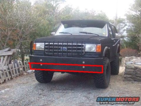1991 Ford Bronco - This 1987 Ford Bronco features a prominent grille and a modified front bumper.