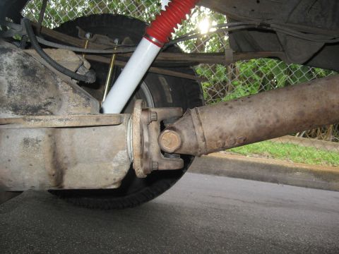 1974 Ford F-100 - Rear axle and driveshaft assembly, showing suspension components and drivetrain parts.