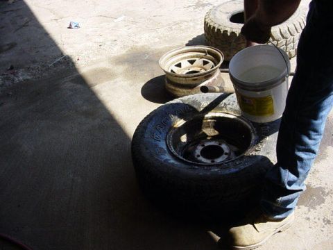 1992 Ford Bronco - How to remove a tire by hand. not my tires so i don't care. it can be hard one them, but they survive. First clean the spot where your gonn…
