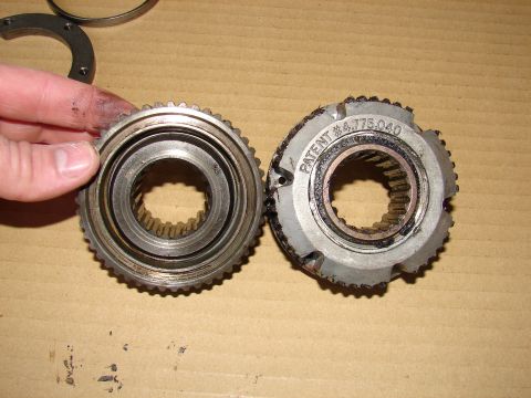 1996 Ford Bronco - Close-up of two gear-like automotive parts, one with patent information visible.