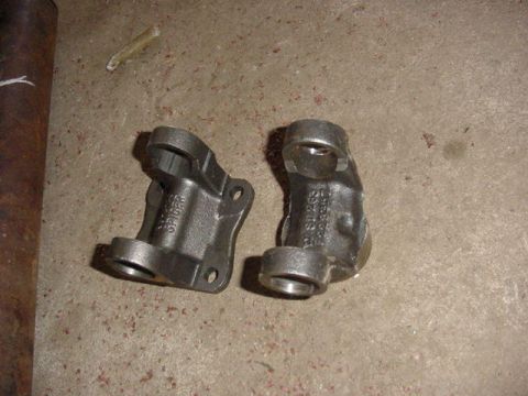 1992 Ford Bronco - 1310 yoke, and flange mine was a 1.877 for the inside tube diameter.