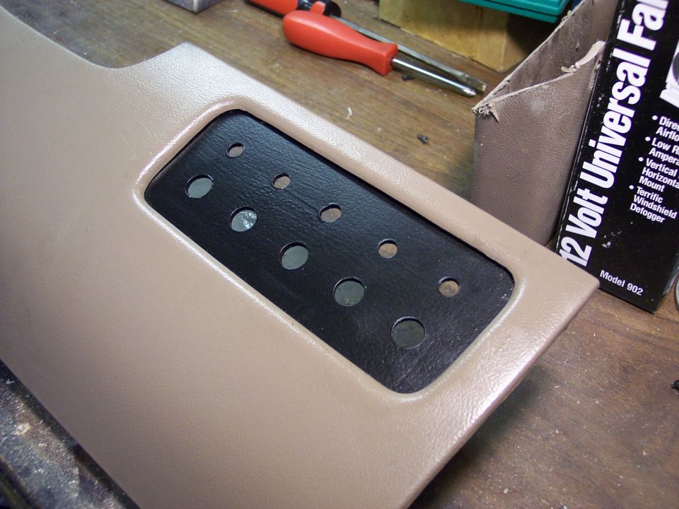 Switch panel mounted up and ready to receive toggle switches.  The top row of smaller holes is for the LED indicator lights.
