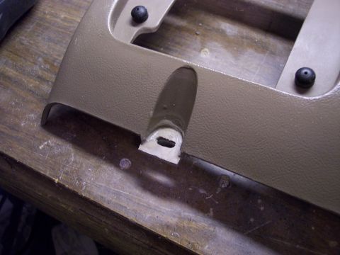 1996 Ford Bronco - While I had the panel out of the truck, I decided to try and fix this mounting tab that had broken off. I cut out a piece of plastic from t…