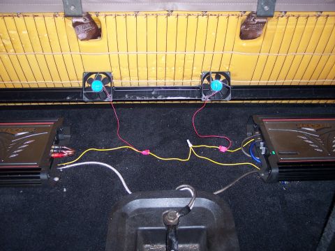 1996 Ford Bronco - Here are the two PC cooling fans I mounted under the back seat to cool the amps. I fastened them to the underside of the seat using cable t…