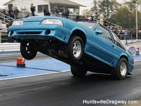 1972 Ford Ranchero - Blue Fox body Mustang drag car performs a wheelie at Huntsville Dragway.