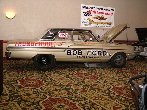 1972 Ford Ranchero - This 1964 Ford Thunderbolt race car is displayed indoors with its hood open.