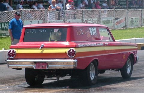 1972 Ford Ranchero - This sedan delivery van, likely a 1964 model, is seen from the rear at a drag strip.