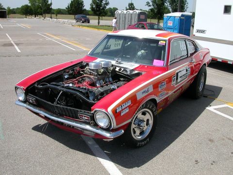 1972 Ford Ranchero - This modified 1970 Ford Maverick is prepped for a drag race, with its powerful V8 engine exposed.