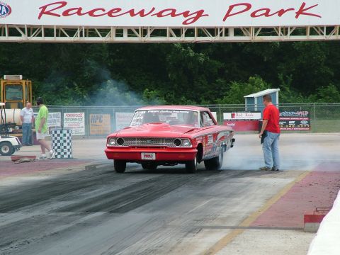 1972 Ford Ranchero - A red 1964 Ford Galaxie drag car performs a burnout at Raceway Park.