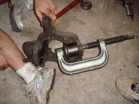 1992 Ford Bronco - THIS is how you press out the bottom joint. By the way, you must press the bottom joint out first.