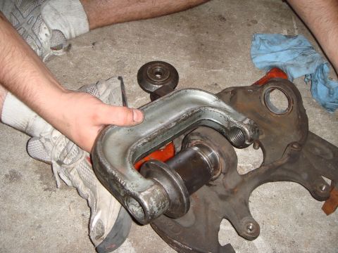 1992 Ford Bronco - Press the upper joint in first. This is how you set the press up; there's a lip on the joint and one of the cups should fit right onto it.