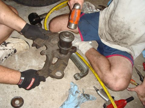 1992 Ford Bronco - Once you've bottomed the joint against the tool (not fully seated in the bore), you'll need to hammer it in the rest of the way. Notice tha…