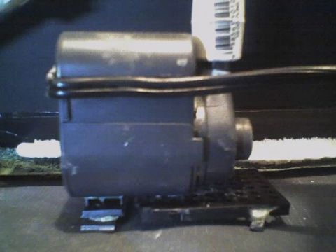 1993 Ford C-350 (Centurion Conversions) - A close-up view of an electric motor with a barcode label.