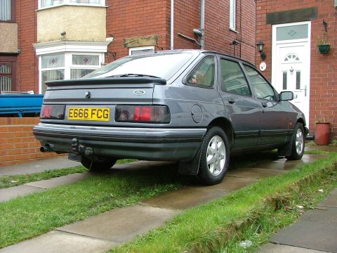 1988 Ford Sport - Rear view of a 1988 Ford Sport parked on a driveway.