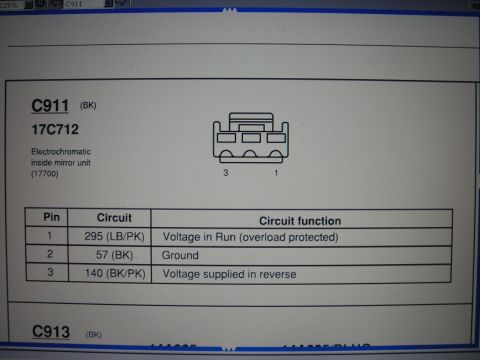 2002 Ford Excursion - This diagram details the electrical connections for an electrochromatic inside mirror unit, including voltage and ground circuits.