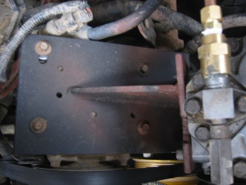 1995 Ford Bronco - the stock A/C compressor doesn't have a rectangular mounting bolt pattern. oopse. pand i need to clean up the excess bracket. i'll do that…