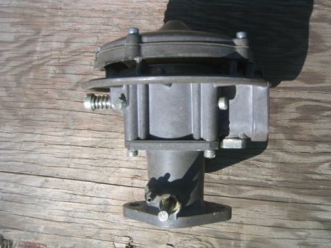 1973 Ford F-100 - Close-up view of an Impco 225 carburetor, a component likely used in older vehicles.