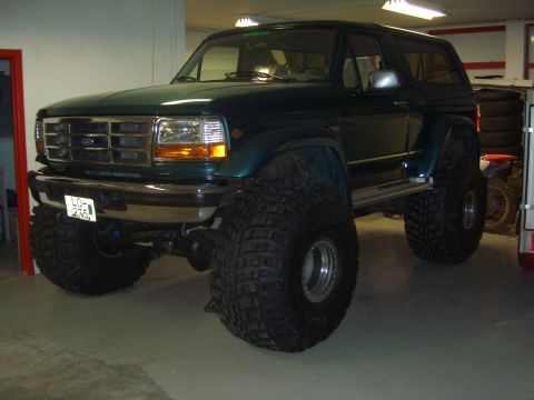 1996 Ford Bronco - This modified 1996 Ford Bronco features an aggressive stance with its oversized tires and lifted suspension.