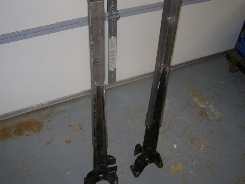 1993 Ford Bronco - These metal support beams appear to be custom fabricated parts, not original vehicle components.