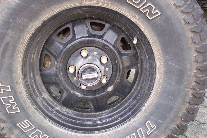 These are my Borg Warner manual locking hubs that I purchased used. I detonated my automatic hubs on my first off roading trip while rocking myself out of a hole. Note the white-out dots to avoid confusion during night off roading.