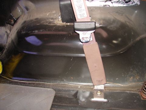 1996 Ford Bronco - This photo shows a seatbelt anchor and strap, not an inner fender.