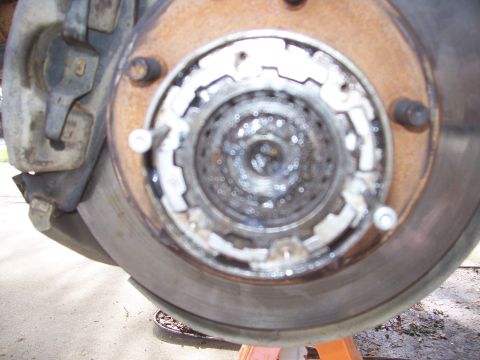 1994 Ford Bronco - Close-up of a Warn Premium hub assembly attached to a brake rotor.