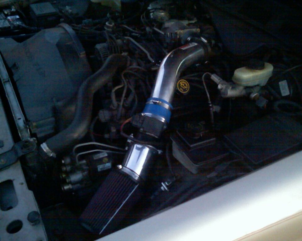 I set my intake a little different. Better flow and it sits deeper in the fender