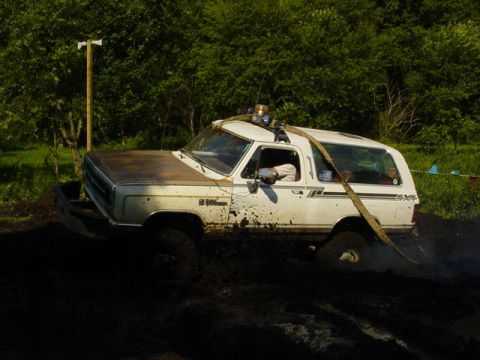 1992 Ford Bronco - This 1992 Ford Bronco is deep in the mud during an off-road event.