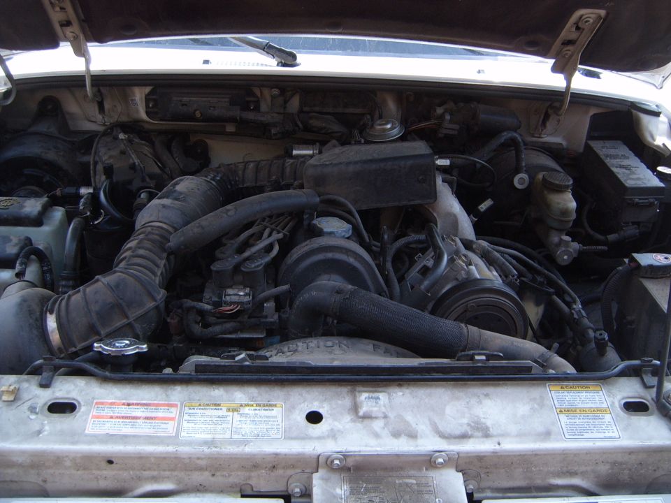 1997 Ford Ranger engine bay with coolant system components visible