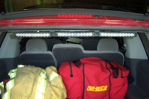 2005 Ford Explorer - The rear cargo area of an SUV contains emergency response gear and auxiliary LED lighting.