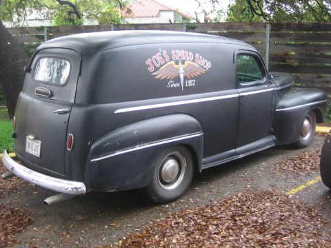 1996 Ford Bronco - This black panel van features a 'Joe's Speed Shop' logo with 'Since 1957' on its side.