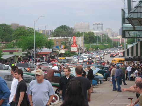 1996 Ford Bronco - A busy street scene with numerous cars and pedestrians, the iconic Austin Motel sign in the background.